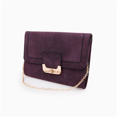 aubergine suede clutch bag.